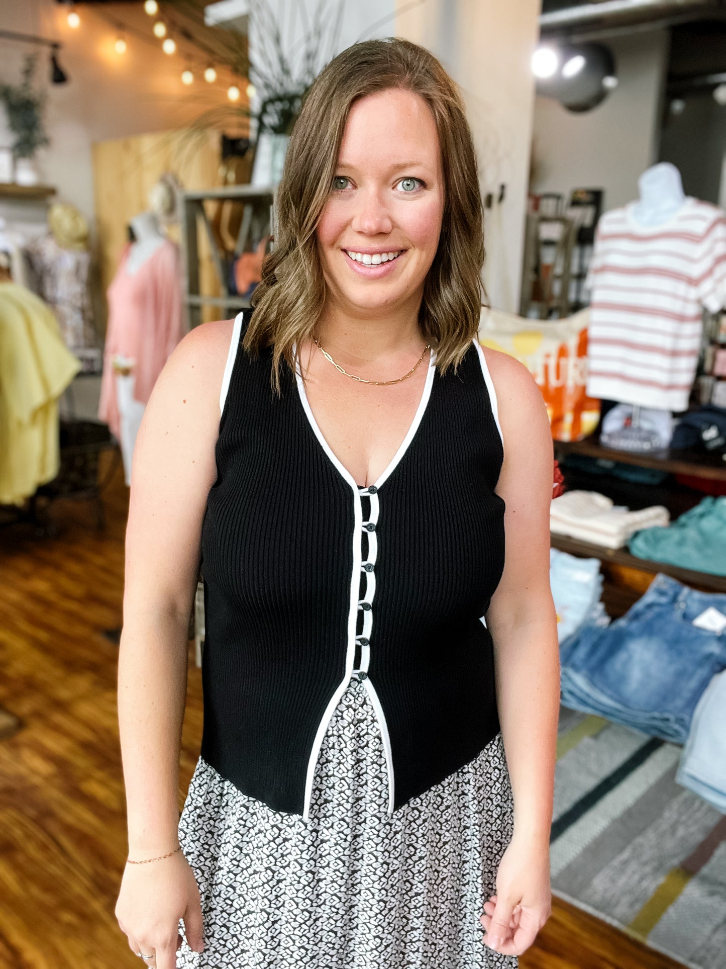 Black Sleeveless Sweater W/ White Trim