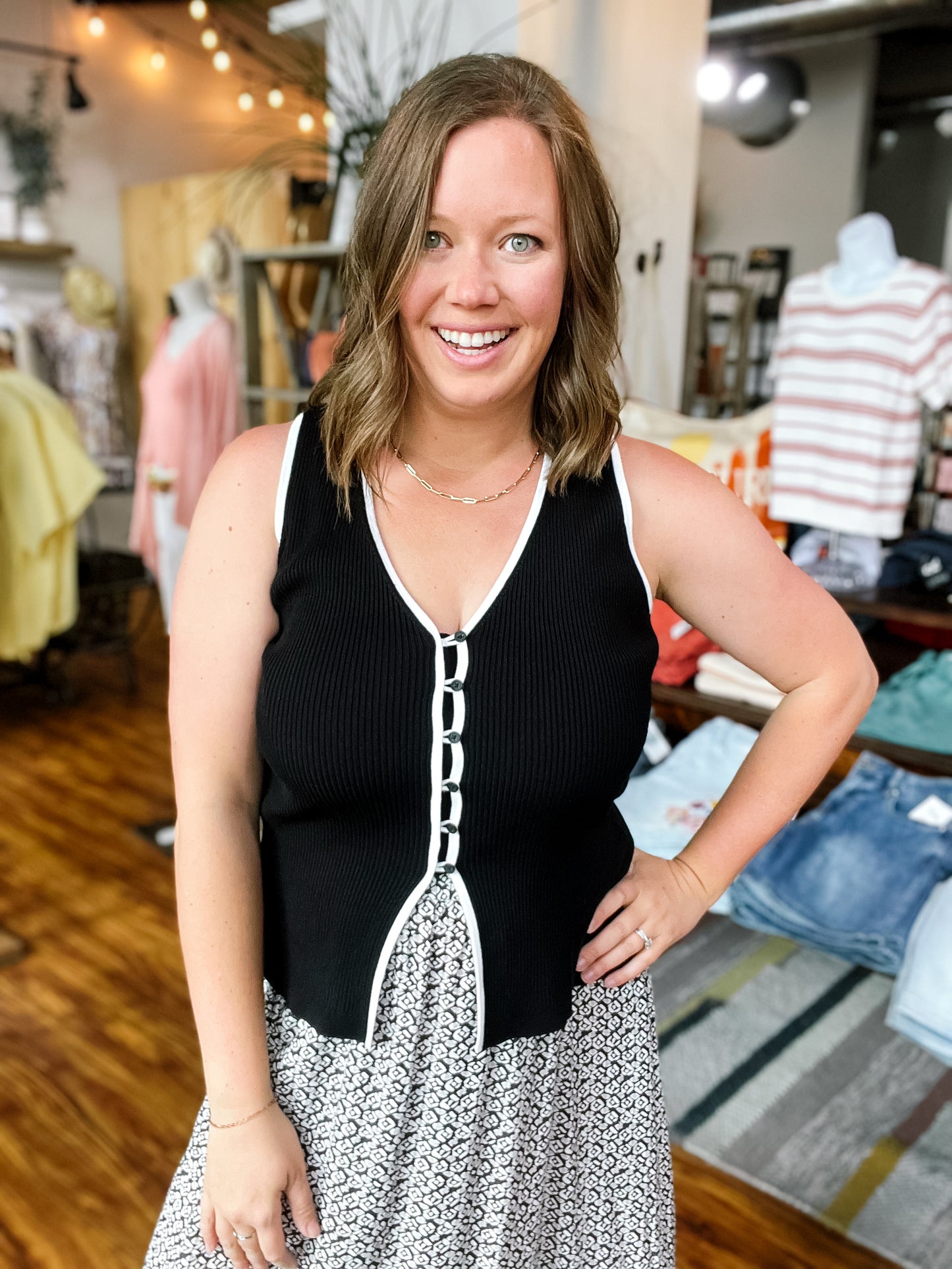 Black Sleeveless Sweater W/ White Trim